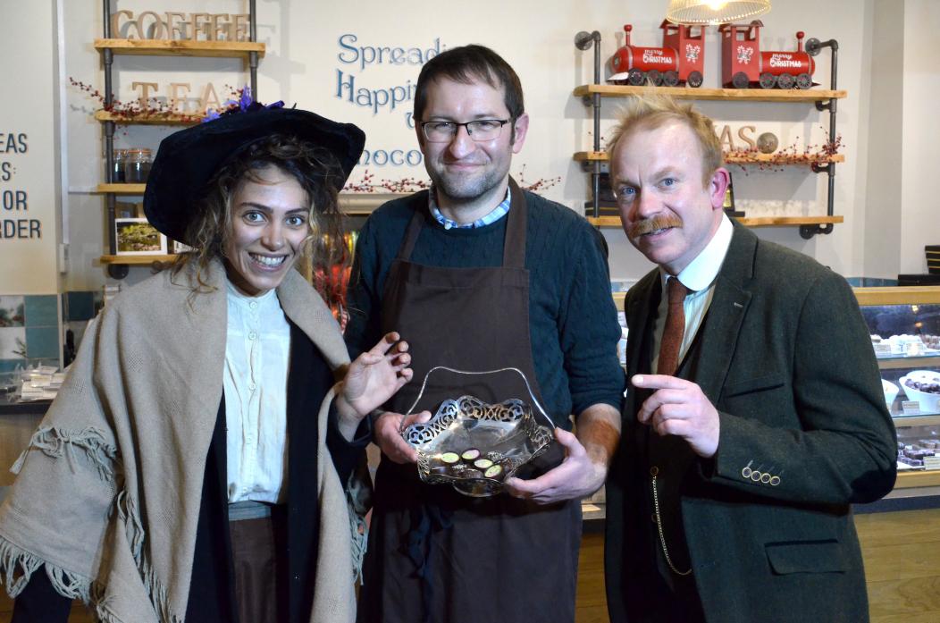 TASTING SUCCESS: Chocolate Fayre’s Kenny Walker with Kennedy Page, who plays Eliza, and Ben Pearson, who takes the role of Professor Higgins in Castle Players’ Pygmalion