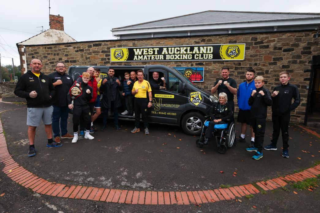BOXING CLEVER: Peter Johnson, second left, with Glenn McCrory at the wheel of the minibus, pictured with coaches, members and supporters of West Auckland Amateur Boxing Gym