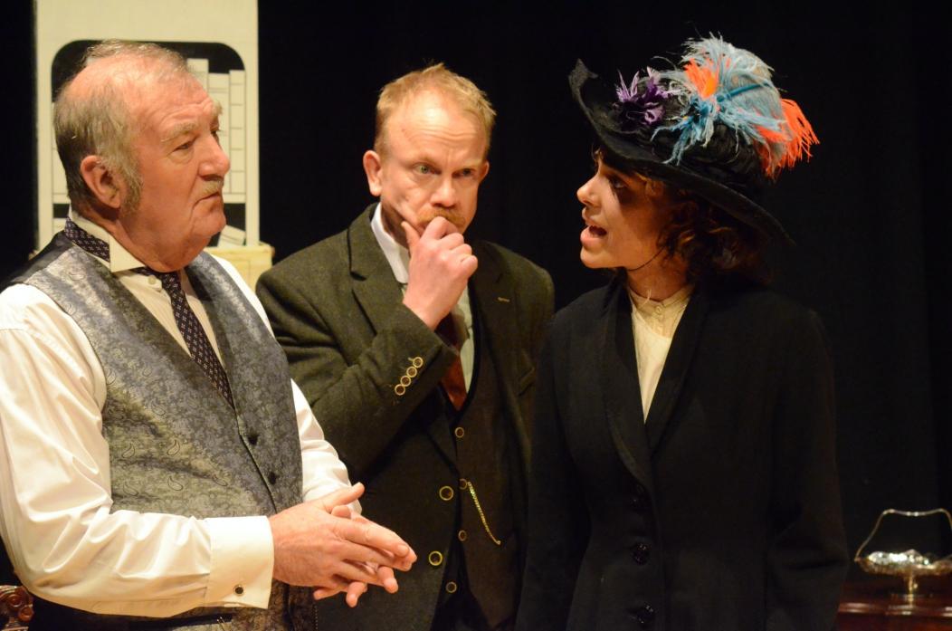 PLAY ON WORDS: Left, Ian Kirkbride and Ben Pearson, as Pickering and Higgins, with Kennedy Page as Eliza