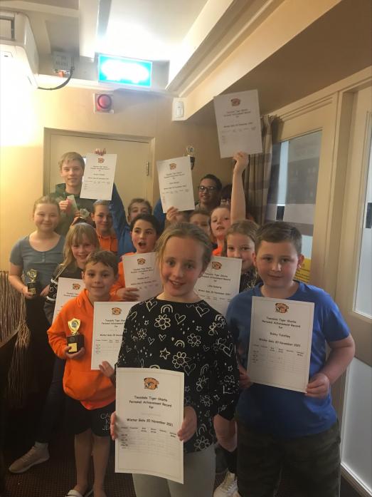 MAKING A SPLASH: Members of Teesdale Tiger Sharks are all smiles after their club gala. They are now looking forward to the first event of the new year – a gala in Sunderland