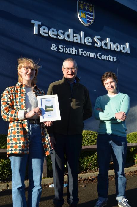 EDUCATION HELP: Toilet twinning organiser Ian Blake presented sixth formers Keira Scott and Sam Crow with a certificate for Teesdale School’s toilet twin