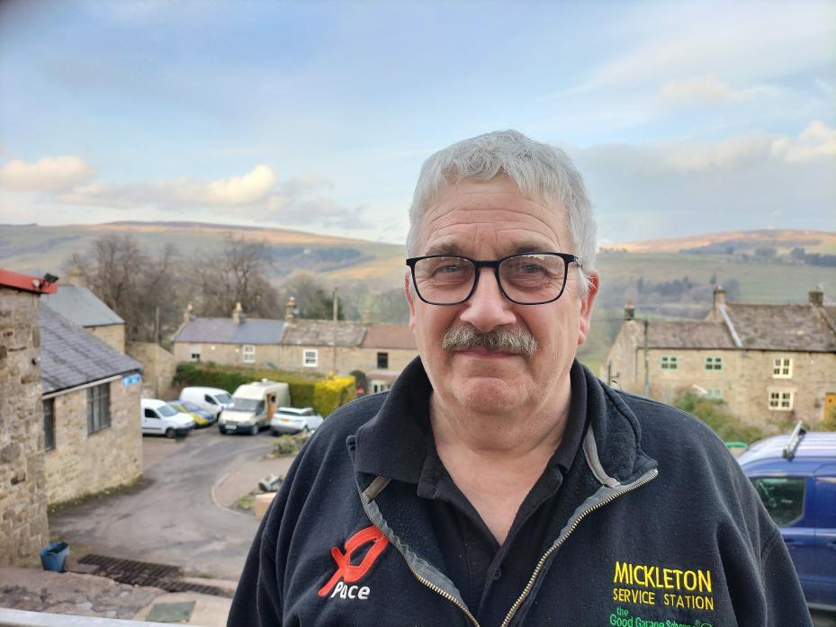 HARD WORK: David Hutchinson with the dale’s view behind