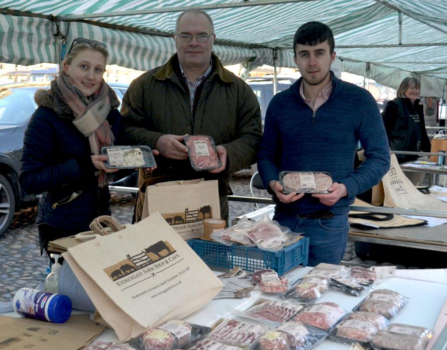 CUT ABOVE: Josh Huitson, right, with partner Tilly Elliott and Stoneygate Farm owner Malcolm Tennant at Barnard Castle Farmers’ Market