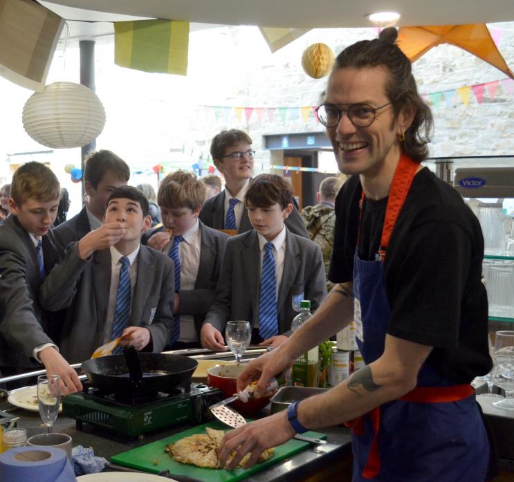 COOKING UP A CAREER: Rupert Philbrick explained how catering could be a career option – with students eager to tuck into what he had prepared