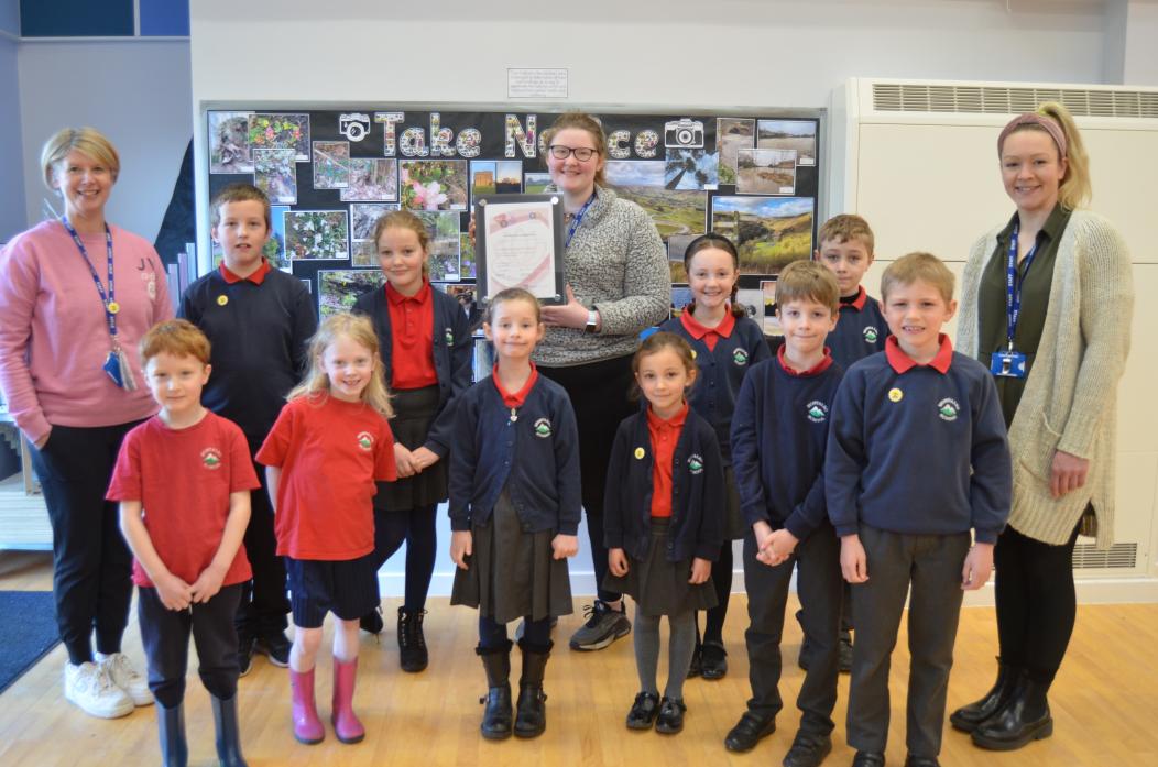 TOP MARKS:  Montalbo School staff and pupils delighted with wellbeing award