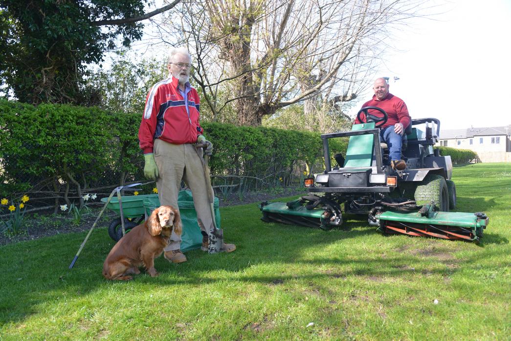 TRANSFORMATION: Robert Furness, Sherlock the dog and Barney FC’s Geoff Thwaites clearing up the borders of Tensfield which were an overgrown wilderness three years ago  	              TM pic