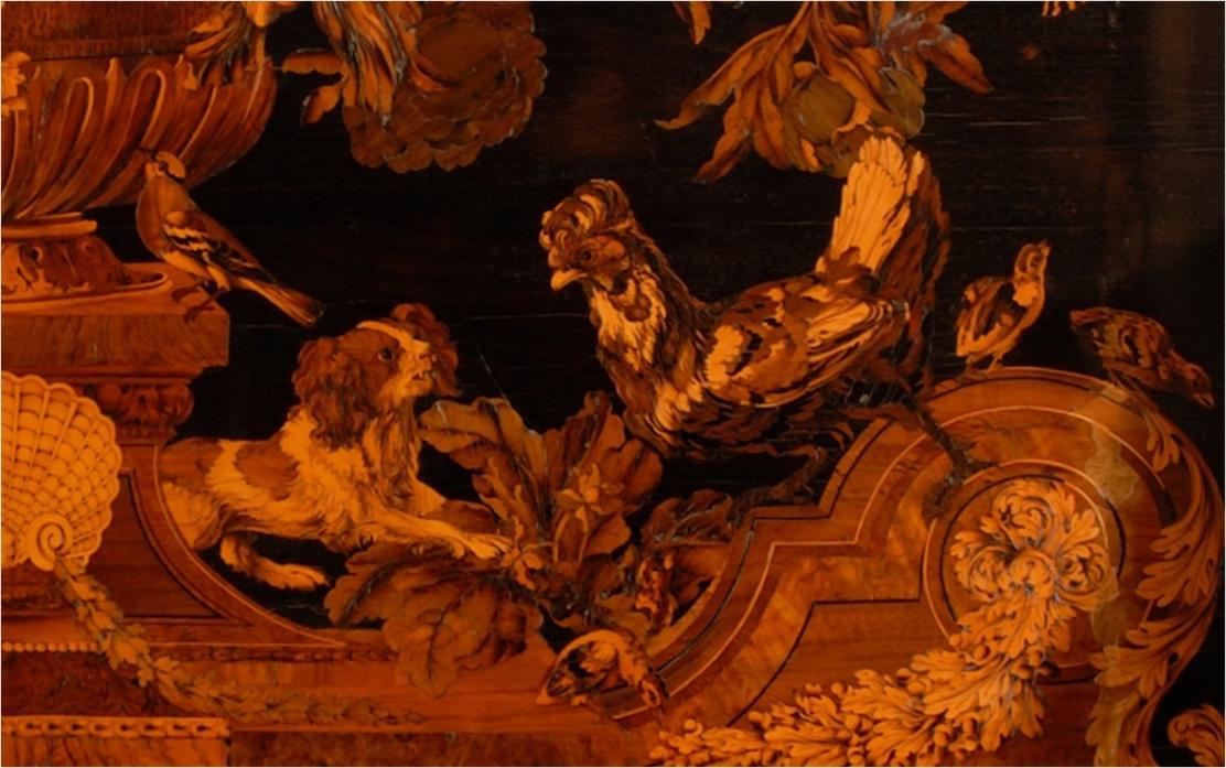EXQUISITE: The 17th century Boulle marquetry which shows a spaniel chasing a hen – just one of the exhibits at The Bowes Museum to feature man’s best friend