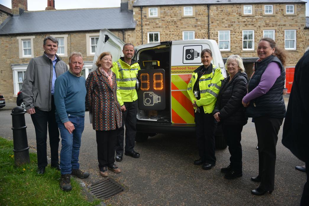 DETERRENT: Inspector Ed Turner and TAP co-ordinator Adam White with Staindrop parish councillors and speedwatch volunteers at the launch of the new unit		              TM pic