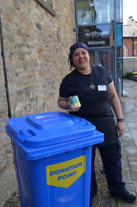 GIVE GENEROUSLY: Cheronie Lynch, from The Witham, in Barnard Castle, says the donation point is already starting to fill up since it was installed earlier this month	                       TM pic