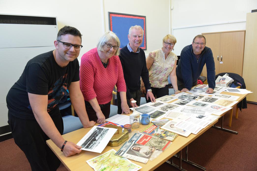 CELEBRATIONS: Randolph centre manager John Bogle along with community group members Jackie Dodds, Brian Carter, Debbie Hugill and Kevin Richardson look through some of the items that will go on display during an exhibition on royalty and life in Evenwood,