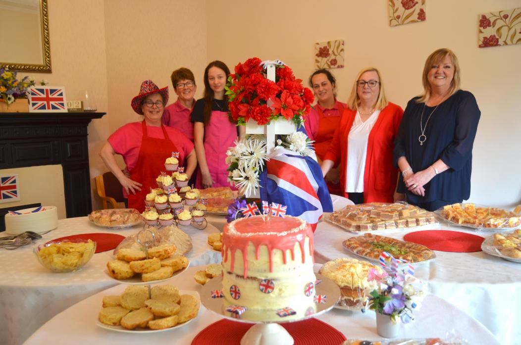 TASTY TREATS: Staff at Abbeyfield put on a sumptuous afternoon tea feast for the event TM pic