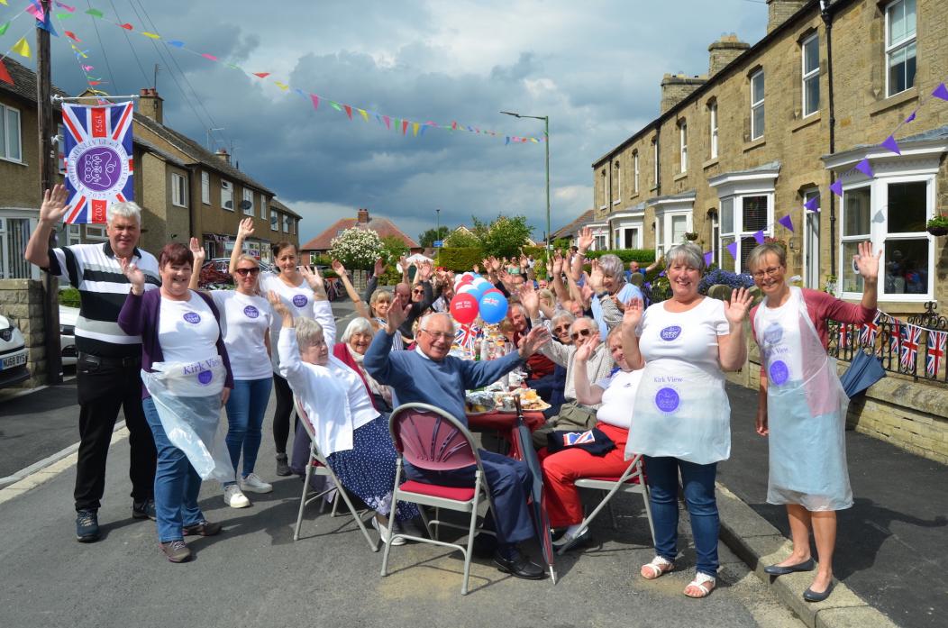 CHEERS: Storm clouds on the horizon didn’t dampen the spirits of residents in Kirk View, Barnard Castle when they held their street party												    TM pic