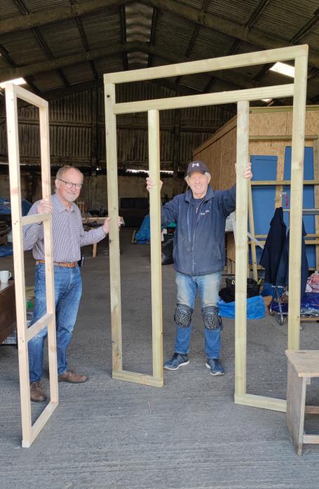 MEN AT WORK: Rob Pearson and Ernie Redfearn, who are building the stage and set for The Castle Players’ production of The Comedy of Errors