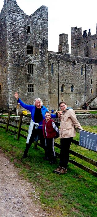 BRILLIANT EFFORT: Isabelle Ford was met by her grandmother Angela Freeman and sister Abigail as she reached the finish line at Bolton Castle TM pic