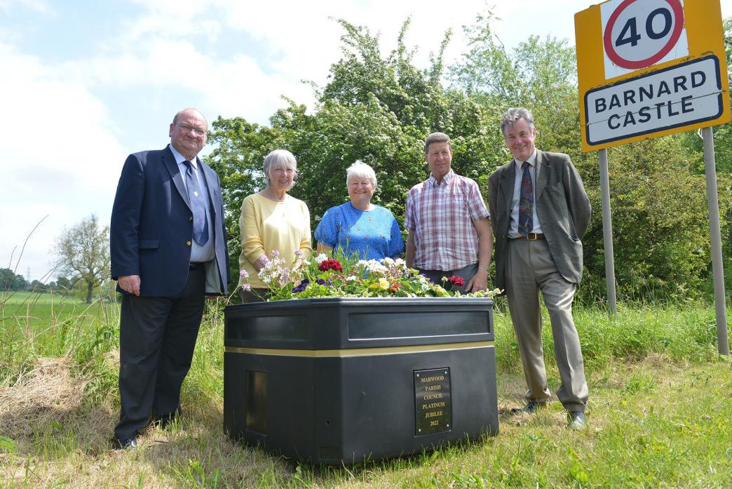 FLORAL WELCOME:  County councillors Ted Henderson and Richard Bell with Marwood parish councillors Pauline Shield, Pauline Glasper and Geoffrey Wilson                                         TM pic