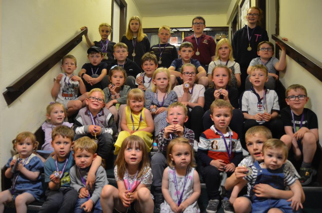 MEDAL WINNERS: Smiles all round from youngsters who received special commemorative medals from Middleton-in-Teesdale and Newbiggin Parish Council to mark the jubilee      TM pic