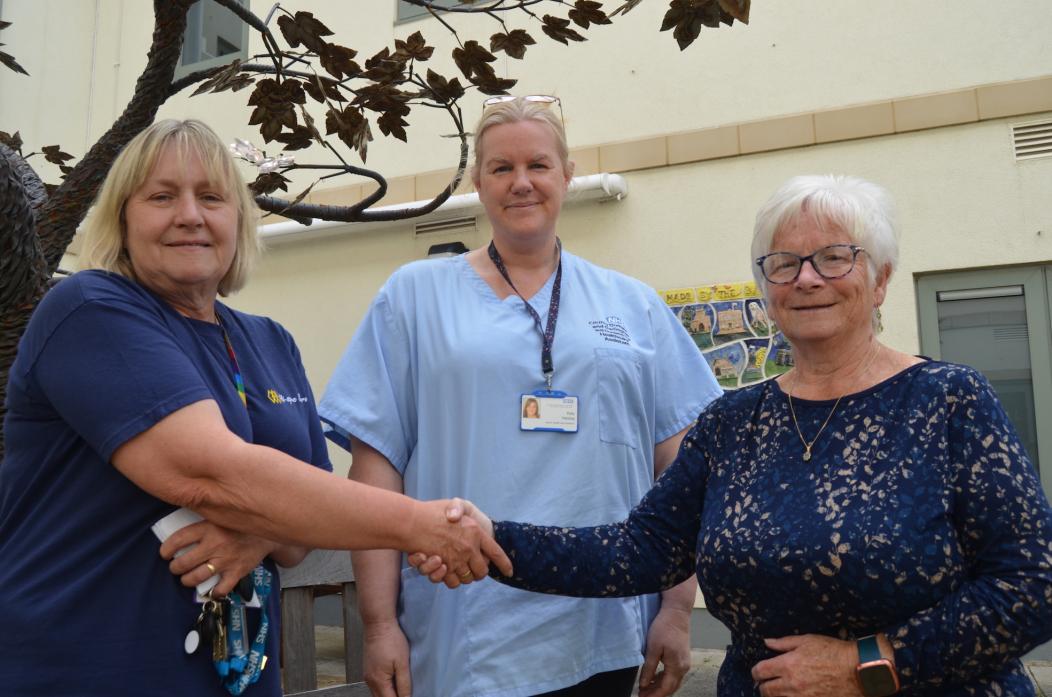 WELL DONE: Big-hearted NHS workers Nancy Coll and Katy Heslop, pictured here with Pauline Harrison, handed over cash to group that supports Richardson Hospital where they work