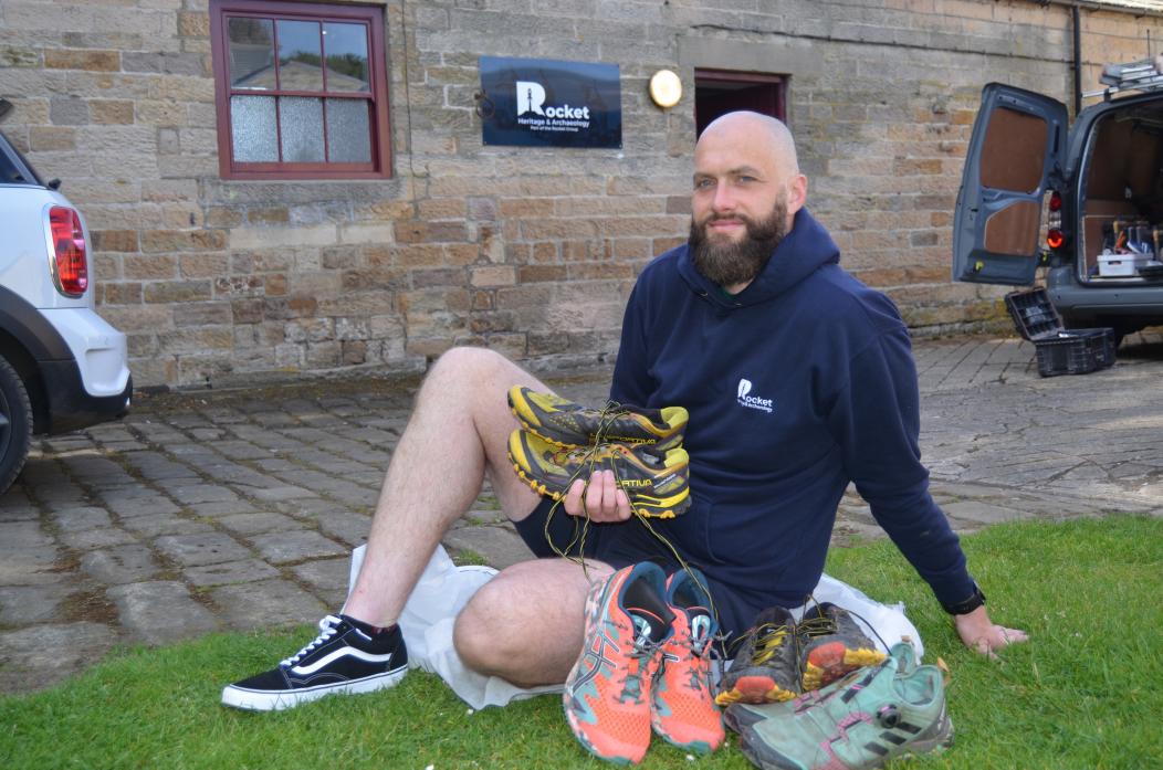 KEEP GOING: Craig Huddart with his worn out shoes