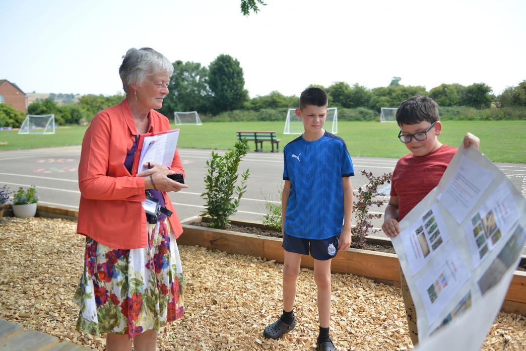 GREEN FINGERS: Teddy and Dalton explain to Northumbria in Bloom judge Joanna Wood how they designed their secret garden
