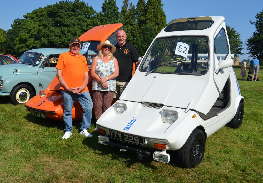 70s STYLE: Keith Bradley, left, with Ian and Sheila Thornton who showed off their Bond Bugs, which were made by Reliant between 1970 and 1974