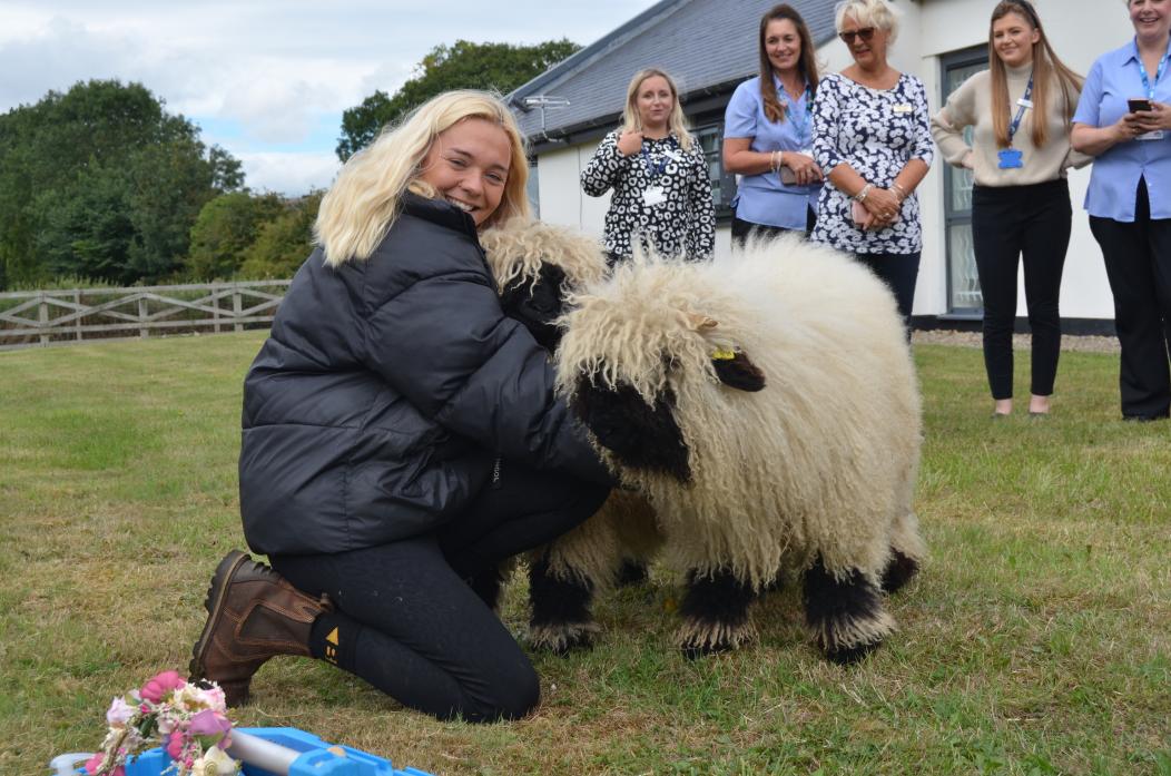 CUDDLY FRIEND: Emily Newton with her “woollies” Nimpy and Noodle  		             TM pic