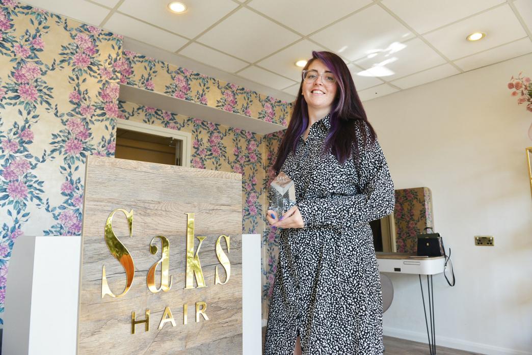TRESS TO SUCCESS: Hairstylist Jess Hesp from Saks Barnard Castle with her special recognition award for outstanding achievement