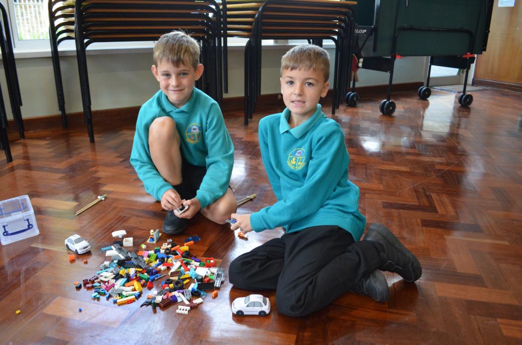 Harry and Toby at working building their Lego car