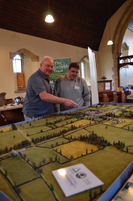HISTORY ENTHUSIASTS: Phil Philo, of the Battlefield Trust, left, studies the scene with model maker Mark Hornsby
