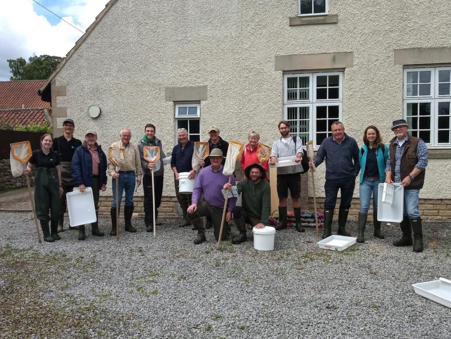 RIVER WATCH: Two groups of river monitoring volunteers, top and in training, above. Inset left, mayfly nymphs are among eight target species whose number indicates the health of the watercourse. Right, flashback to the pollution incident in April