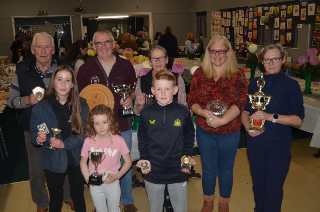 PRIZE GUYS: Trophy and cup winners Barry Watson, Anth Coatsworth, Mary Elliott, Sam Pickering, Elizabeth Beach, Skye and Floraidh Crawford and Oliver Hodgeson