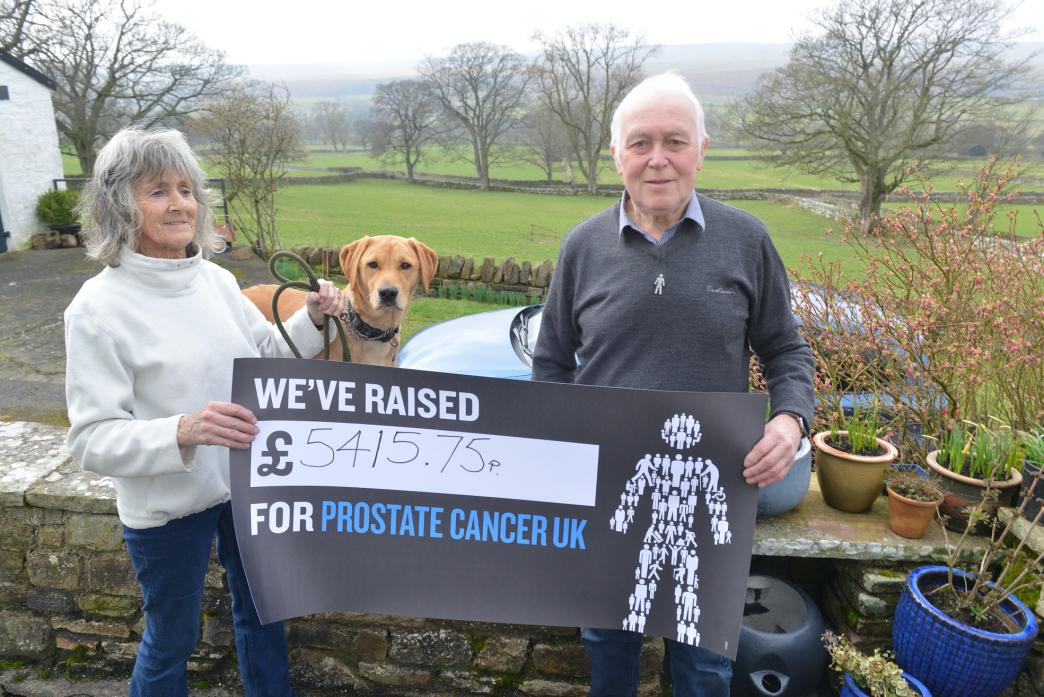 EMOTIONAL EVENING: Barry and Jacky Meeson, along with dog Max, are overwhelmed by the support they received for their fundraising domino knockout that raised cash for Prostate Cancer UK 								              TM pic