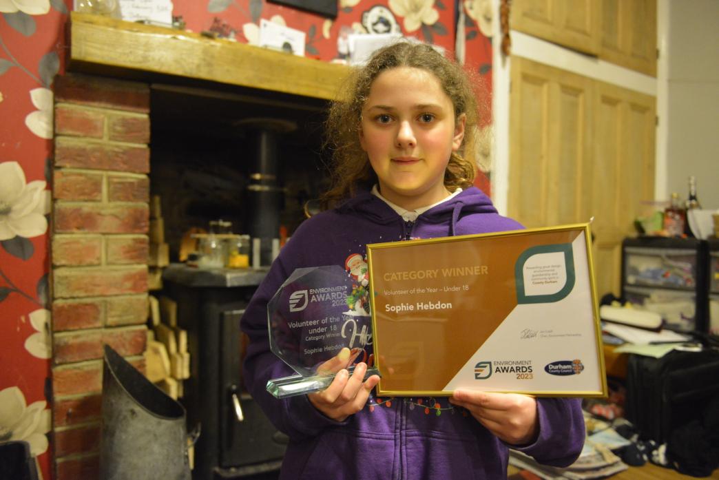 HEDGEHOG CHAMPION: Sophie Hebdon proudly displays her trophy and certificate              			TM pic