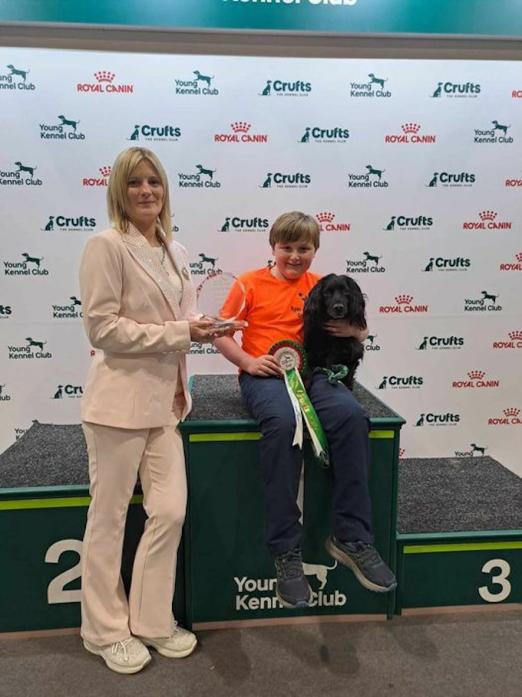 WELL DONE: Ryan Raine, with mum Louise, and Gunner the Cocker Spaniel took top podium spot at Crufts