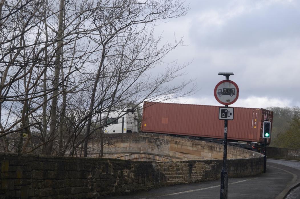 NO GO: A HGV flouts the weight limit and crosses the County Bridge – although statistics say fewer lorries are ignoring the weight restrictions				             TM pic