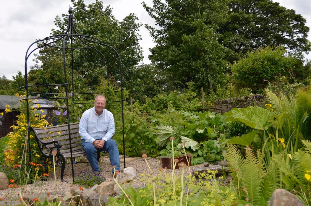 COME ON IN: Ian Brown doing a little dead heading prior to NGS open day at Cotherstone