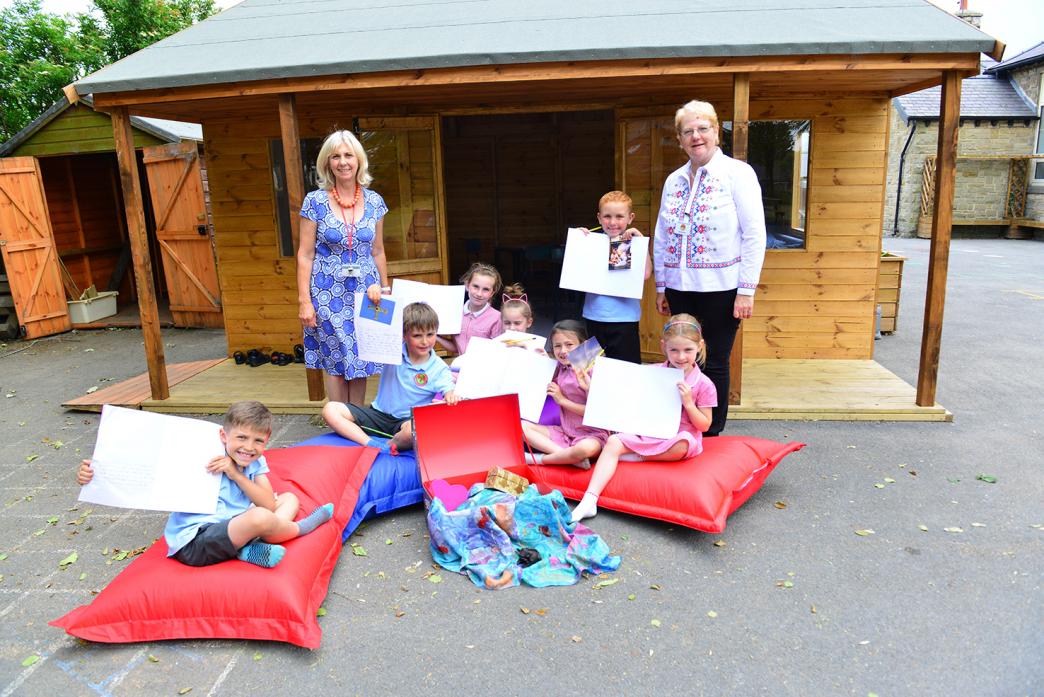 GREAT: Teacher Anne Dauber and county councillor Heather Smith with pupils Oliver Skene, Bertie McNab, Maddison Metcalfe, Summer Tennick, Ellie Baker, Mason Lee and Ella Linsley outside the new outdoor classroom