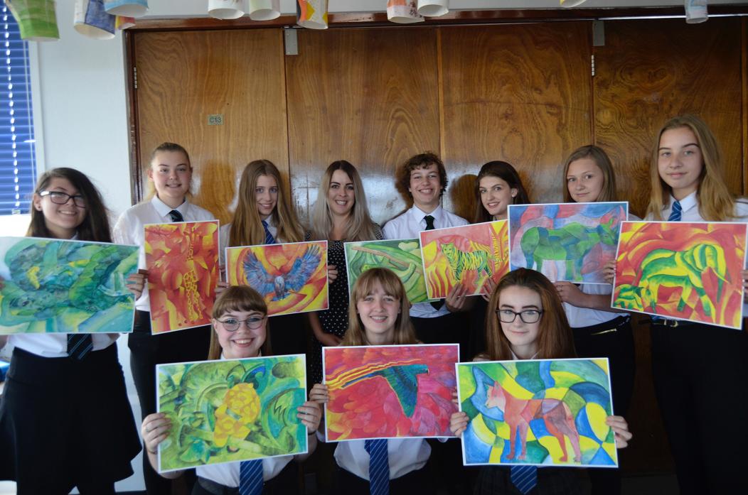 BUDDING ARTISTS: Teesdale School students with artwork which will be soon be on sale at London Zoo