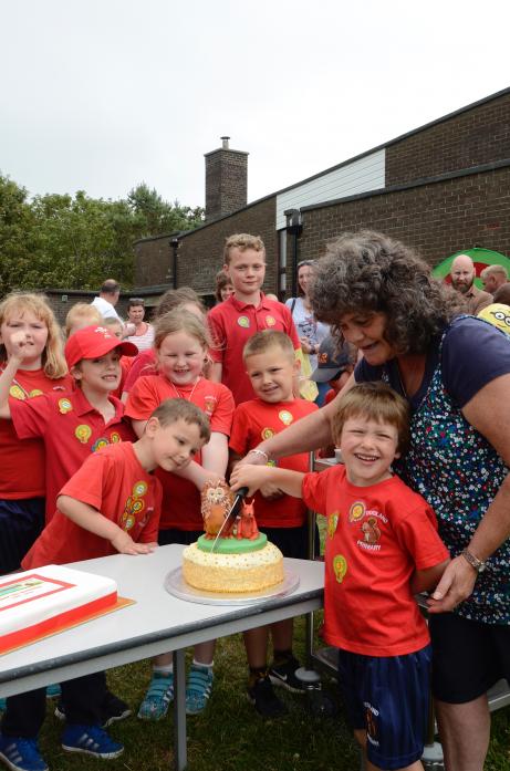 HAPPY BIRTHDAY: Birthday Celebrations at Woodland School as Jacqui Richardson and Douglas Hart cut the cake