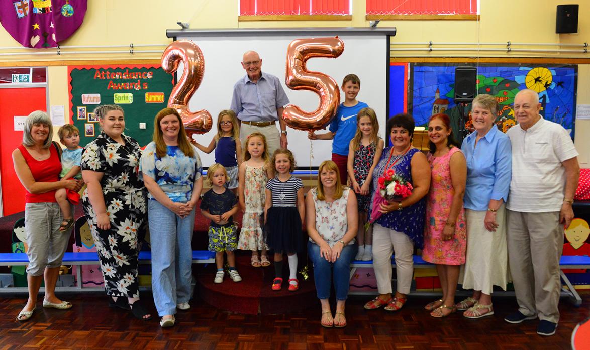 BIG BASH: John Jackson, headteacher when Evenwood Primary School's nursery was opened, takes centre stage surrounded by parents, teachers and pupils