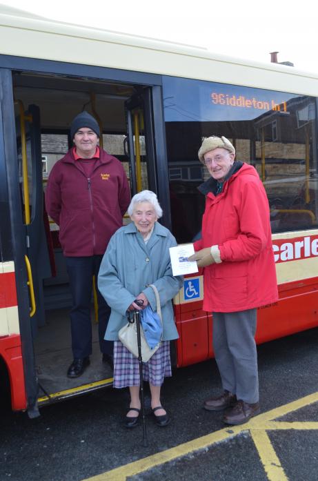 TICKETS PLEASE: Scarlet Band bus driver David Suggett  with passengers Dorothy Barker and John Elliott