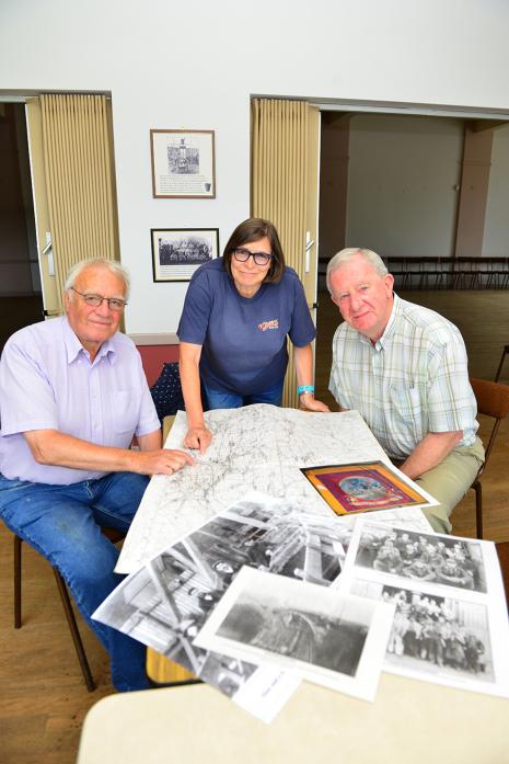 LOOKING BACK: Gaunless Valley History Trust chairwoman Jeanette Newell and members Raymond Kellett and Fred Aitken look over some of the items that will feature during their exhibition next month