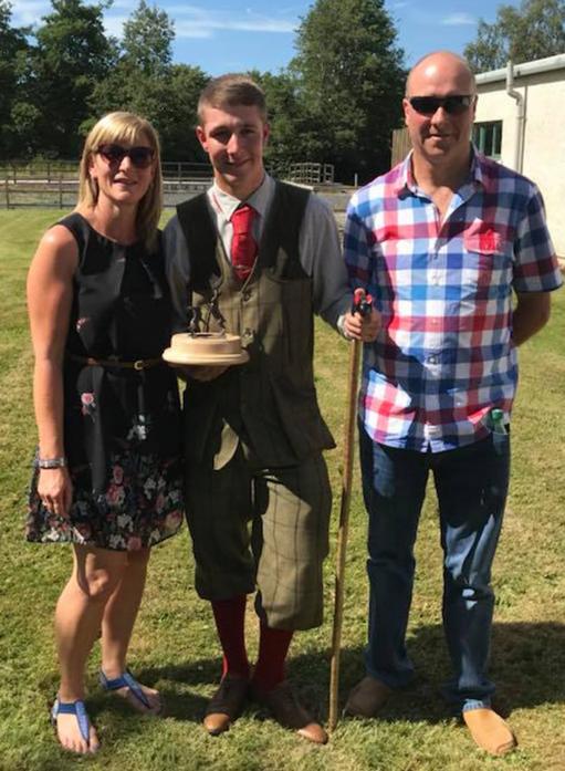 WELL DONE SON: Harry Tunstall with parents Davina and Christopher Tunstall after receiving his award